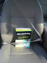 book in car passenger seat
