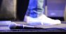3 Content Strategy Lessons from Seattle Interactive Conference 2018 - Tim Mehta on stage with a microphone and sneakers